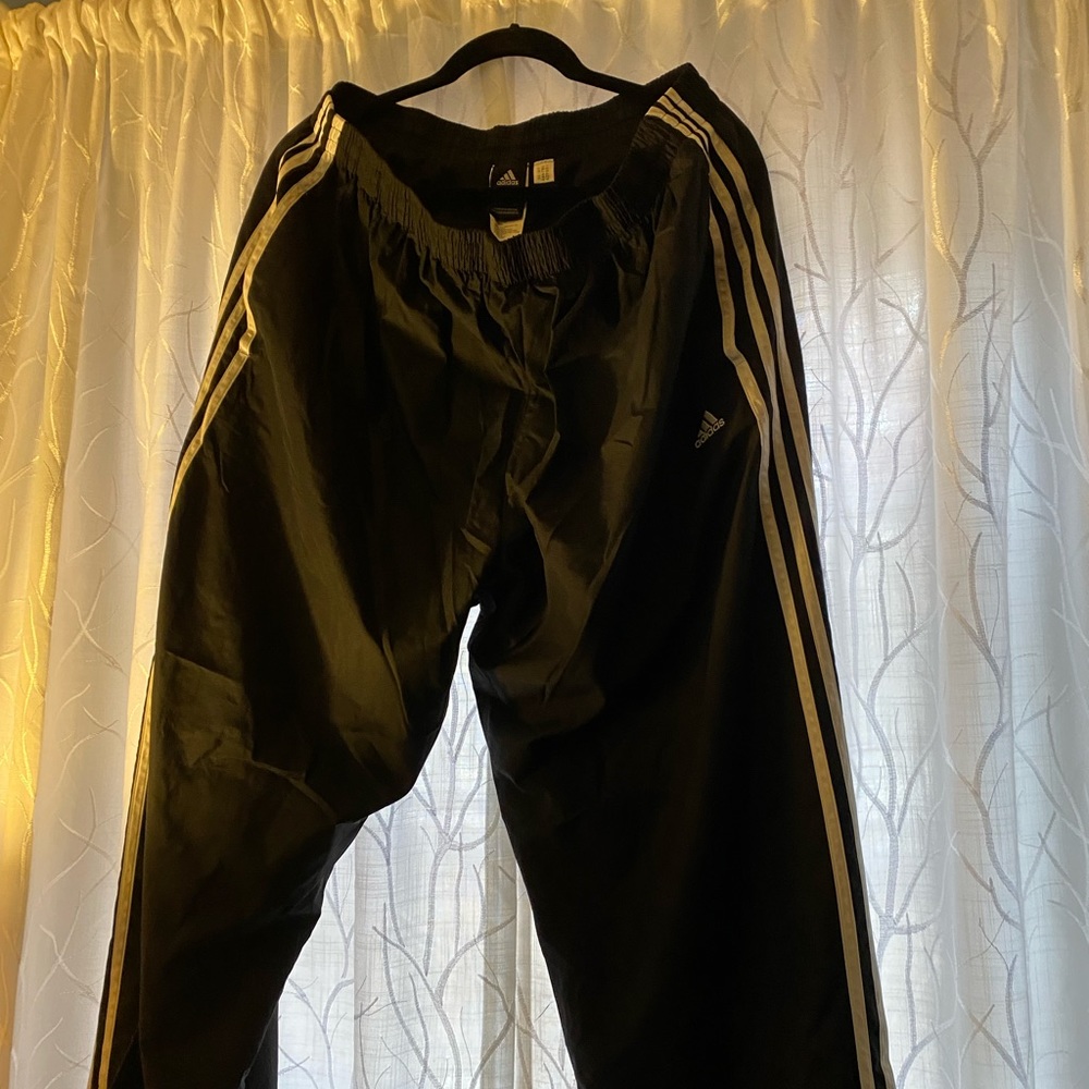 Adidas nylon ladies athletic pants.
